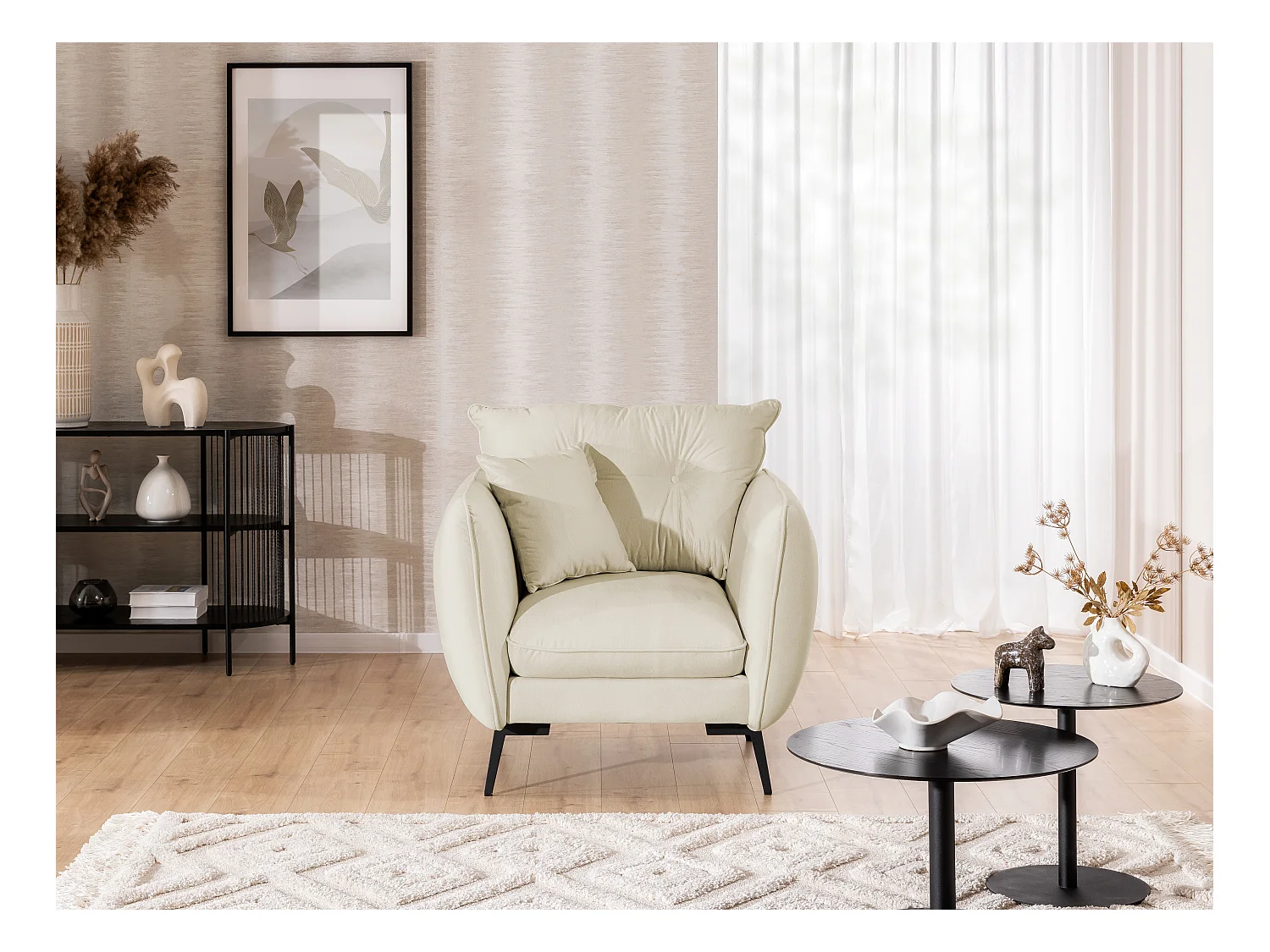 Fauteuil en tissu avec de hauts pieds en métal noir Nordloft