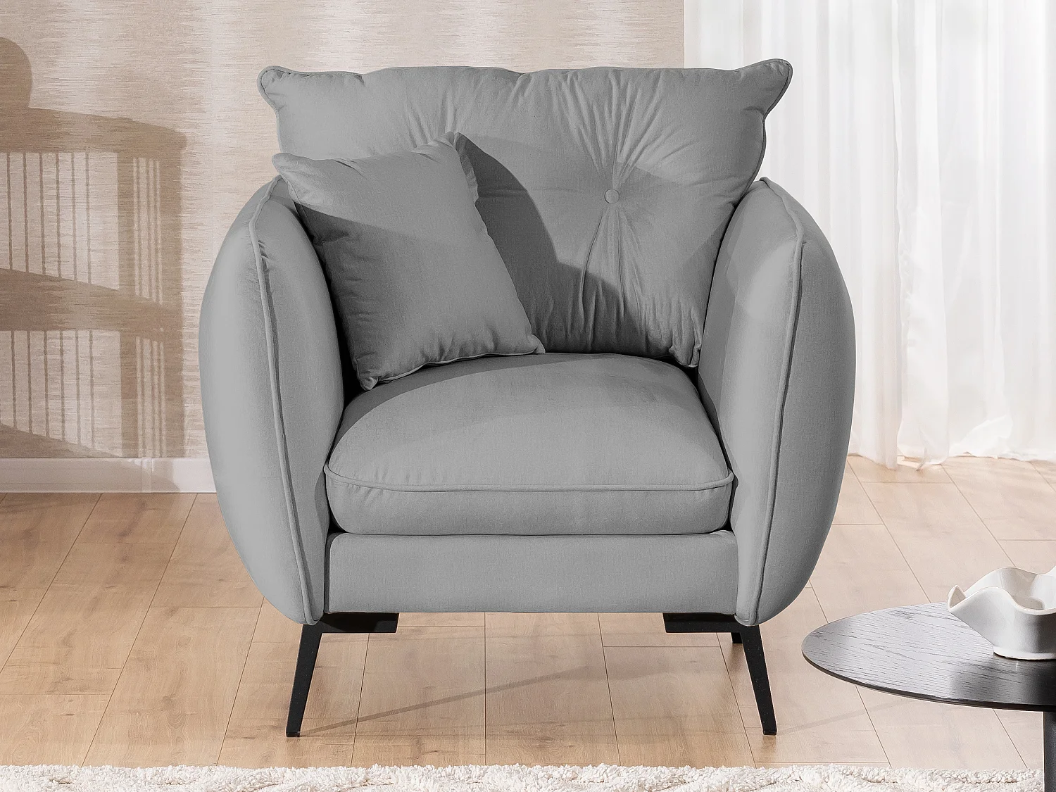 Fauteuil en tissu avec de hauts pieds en métal noir Nordloft
