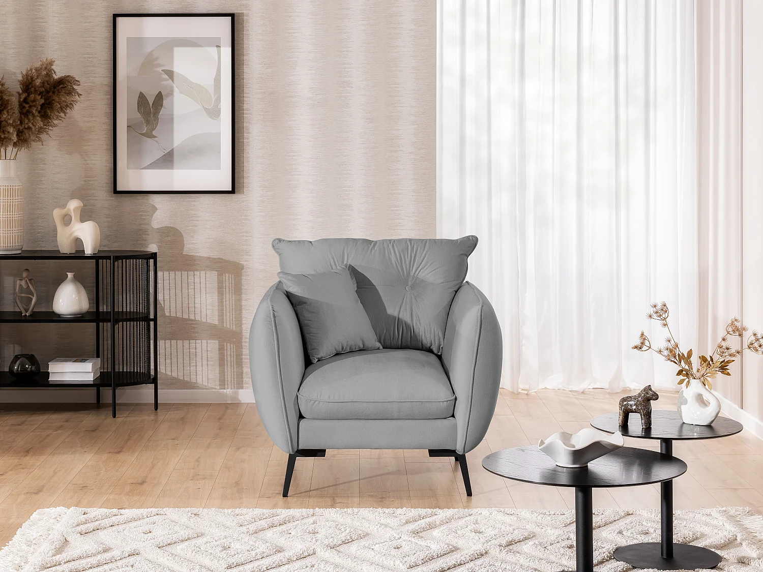 Fauteuil en tissu avec de hauts pieds en métal noir Nordloft