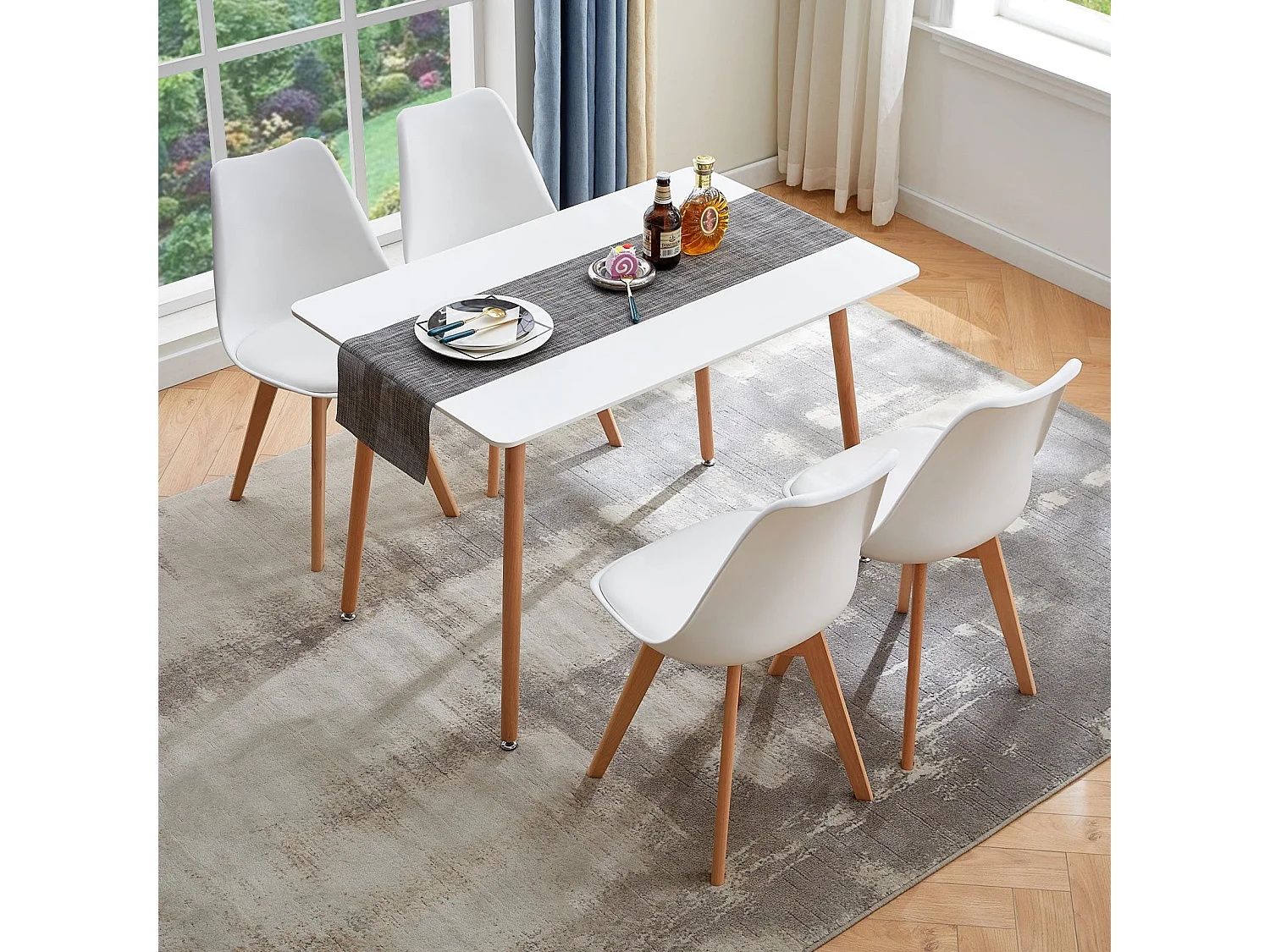 Ensemble de Table et Chaises - Table Blanche pour 2 à 4 Personnes Accompagnée de 4 Chaises Blanches au Design Épuré