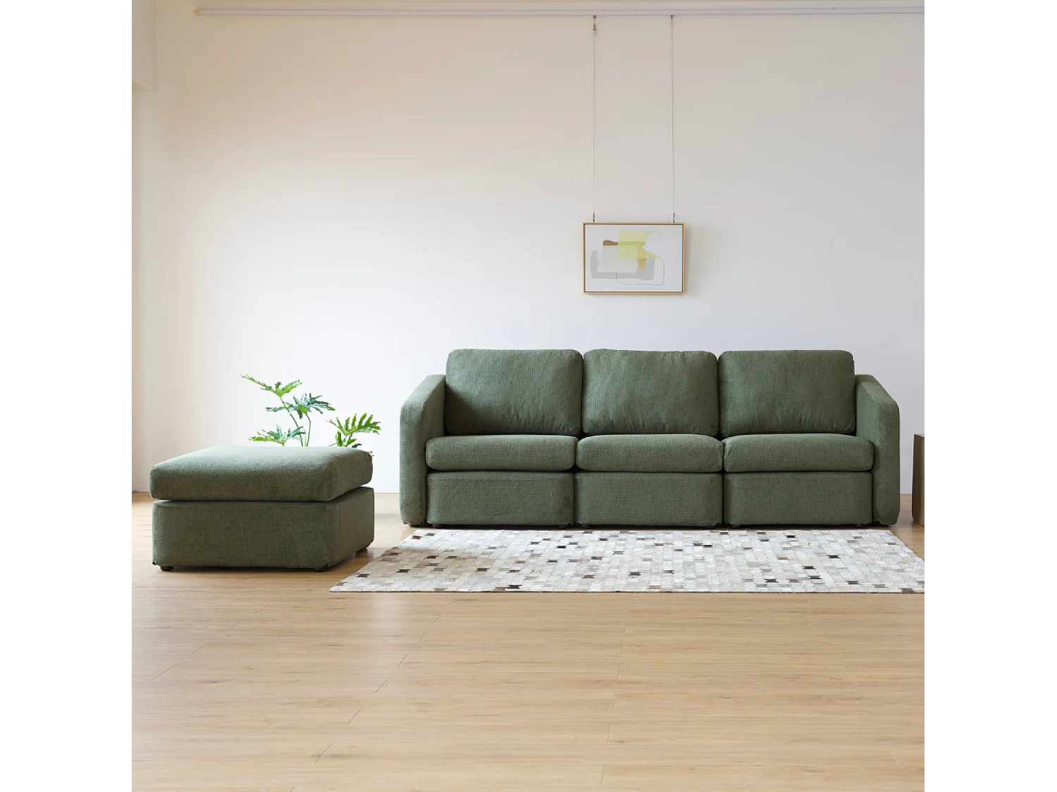 Canapé 3 places modulable vert avec pouf KONEKT