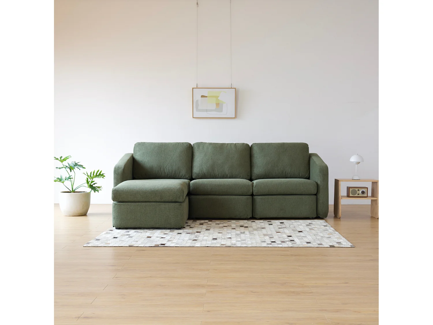 Canapé 3 places modulable vert avec pouf KONEKT