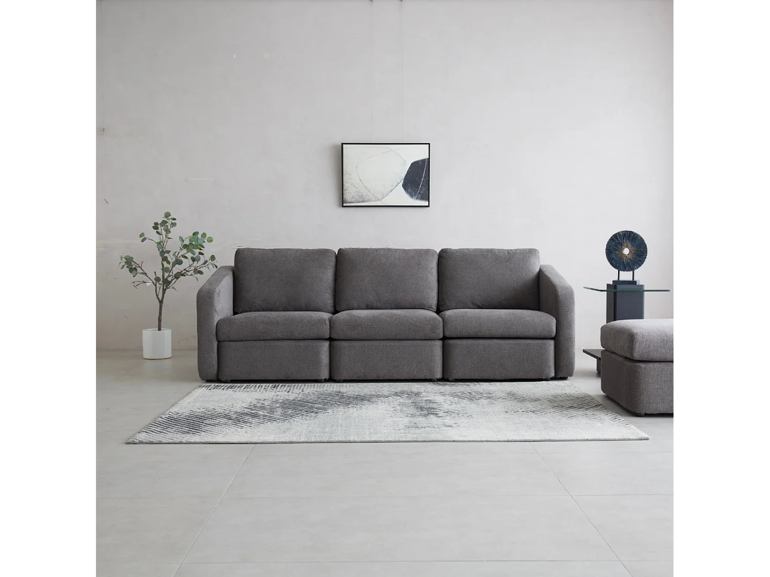 Canapé modulable 3 places gris foncé avec pouf KONEKT