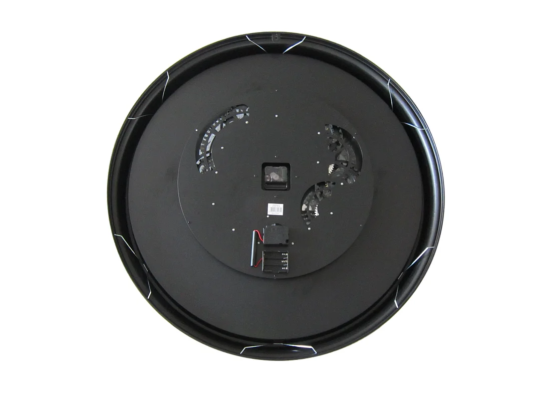 Horloge mécanismes noir et doré 80cm