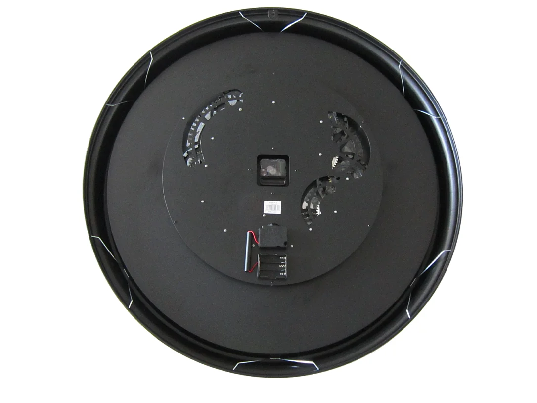 Horloge mécanismes noir et doré 80cm