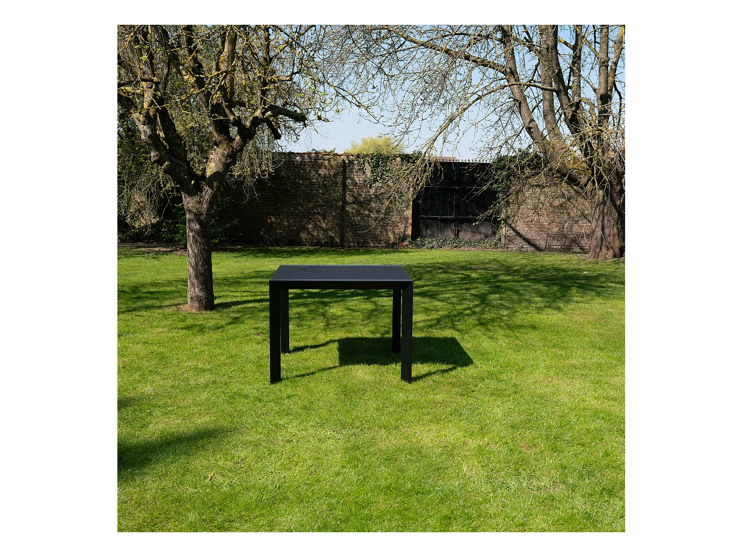 Table de jardin 4/8p en aluminium et plateau en verre poli Noir MODULO