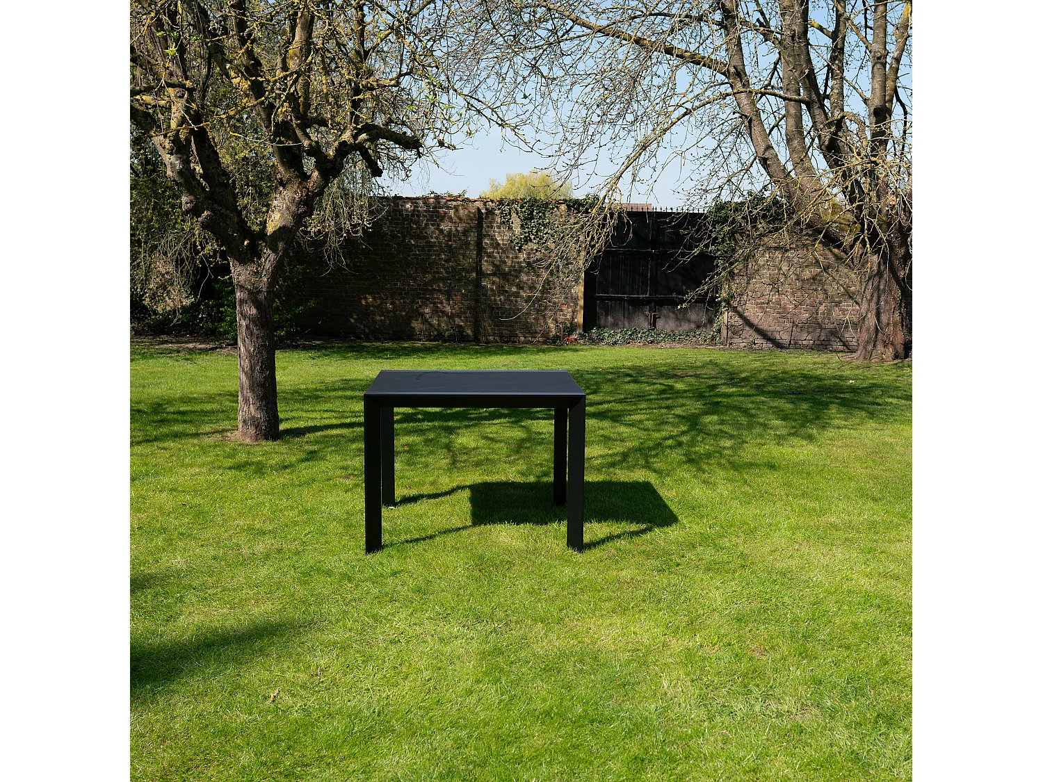 Table de jardin 4/8p en aluminium et plateau en verre poli Noir MODULO
