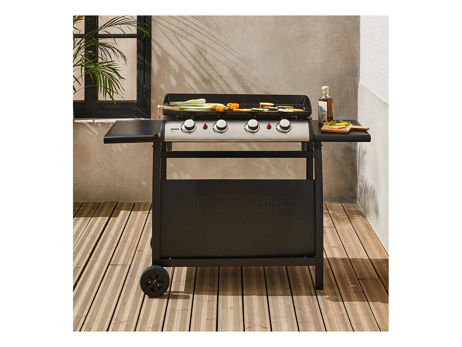 Plancha au gaz 4 brûleurs sur chariot - Porthos - 10kW. plancha à gaz avec desserte . cuisine extérieure. plaque émaillée. inox. barbecue