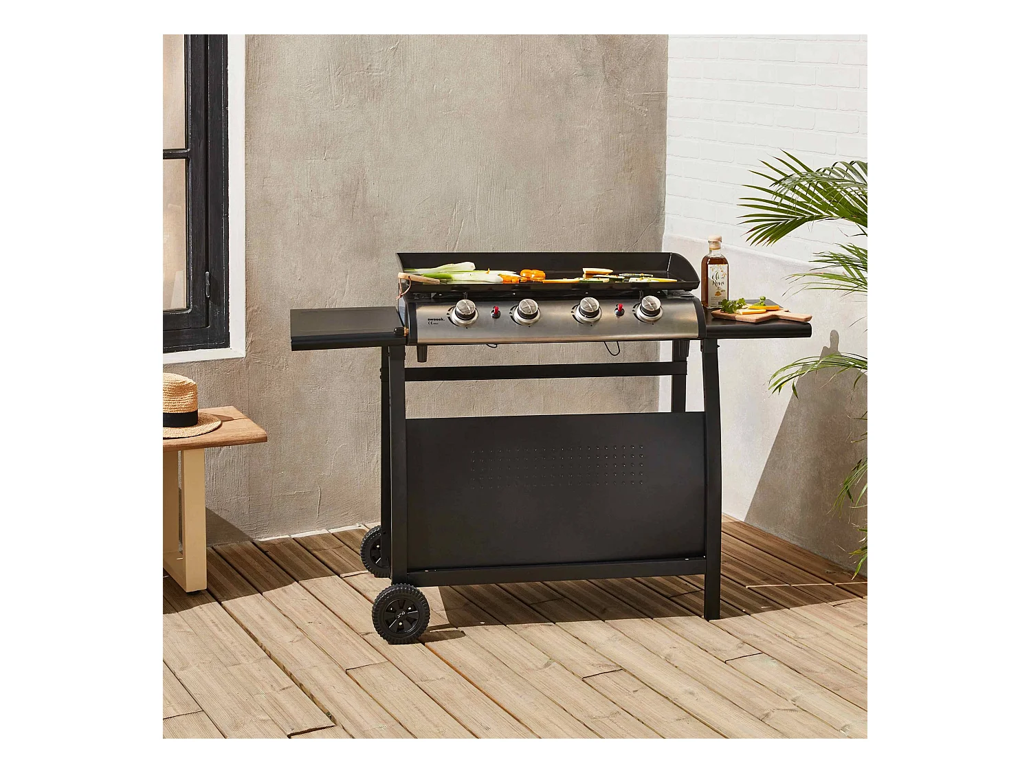 Plancha au gaz 4 brûleurs sur chariot - Porthos - 10kW. plancha à gaz avec desserte . cuisine extérieure. plaque émaillée. inox. barbecue