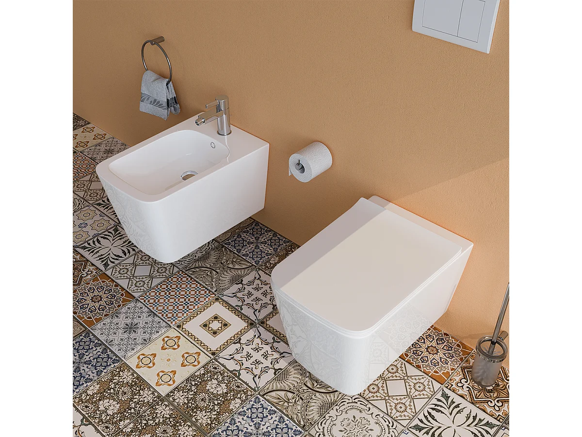 Sanitari bagno Bidet e Vaso WC SOSPESI filomuro RIMLESS in ceramica con sedile coprivaso softclose CUBE