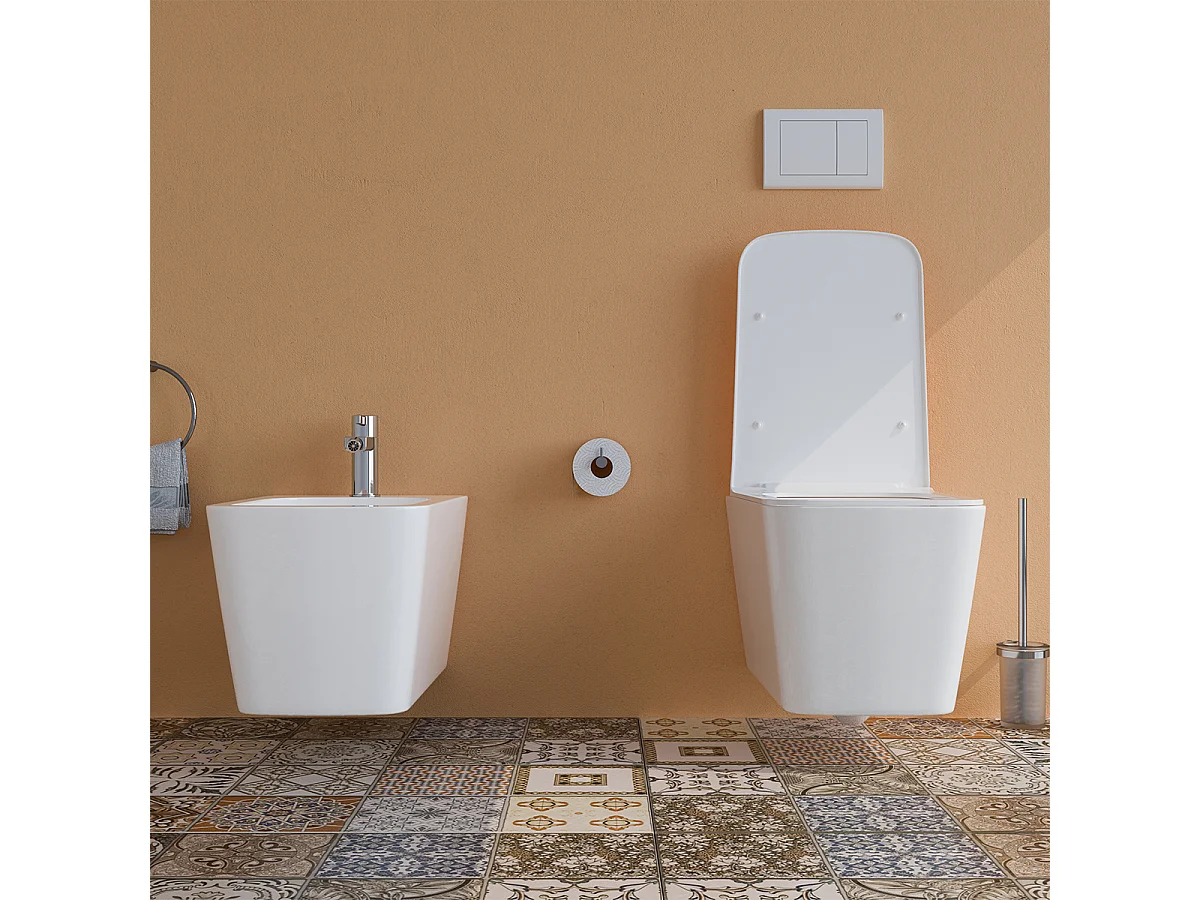 Sanitari bagno Bidet e Vaso WC SOSPESI filomuro RIMLESS in ceramica con sedile coprivaso softclose CUBE