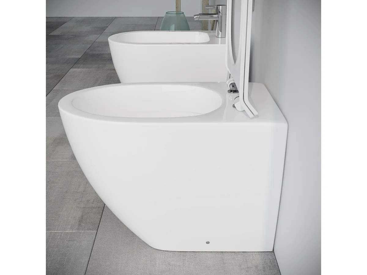 Vaso WC filomuro RIMLESS A TERRA in ceramica con sedile coprivaso softclose - Fast