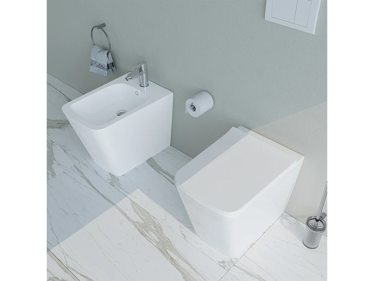 Sanitari bagno Bidet e Vaso WC a terra filomuro RIMLESS in ceramica con sedile coprivaso softclose CUBE