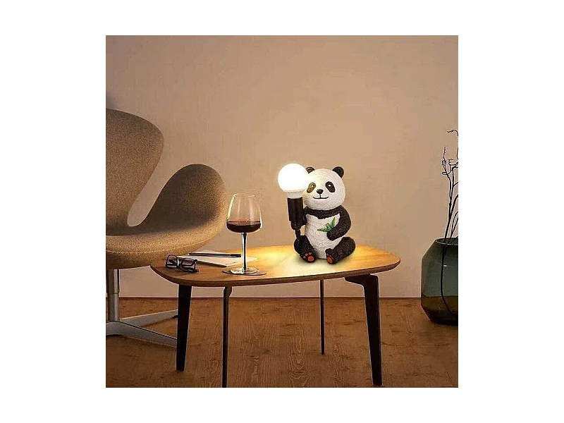 Lampe de table créative en résine représentant un panda assis, culot E27, idéale pour un salon ou une chambre d'enfant. Ampoule non incluse