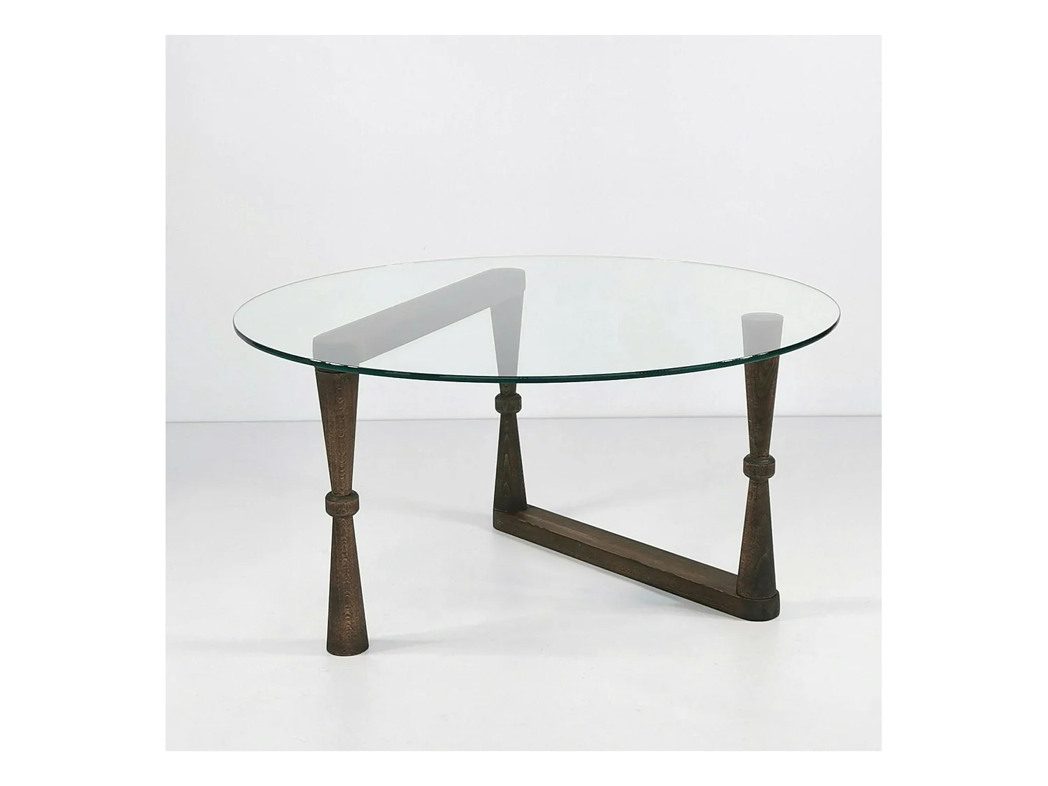 Table basse en verre ronde - pied bois sculpté BOMA