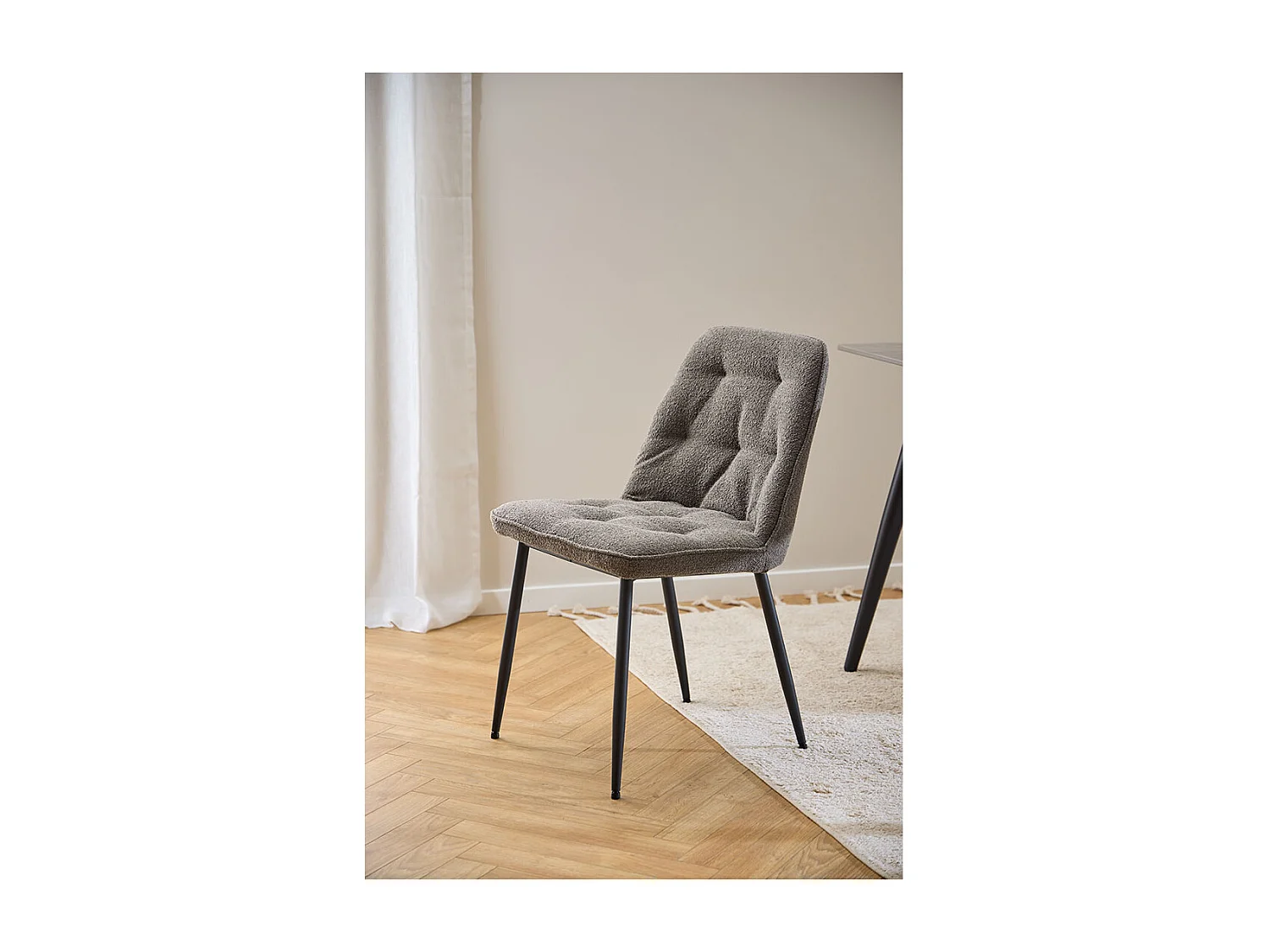 Solara eetkamerstoel bouclé grijs.