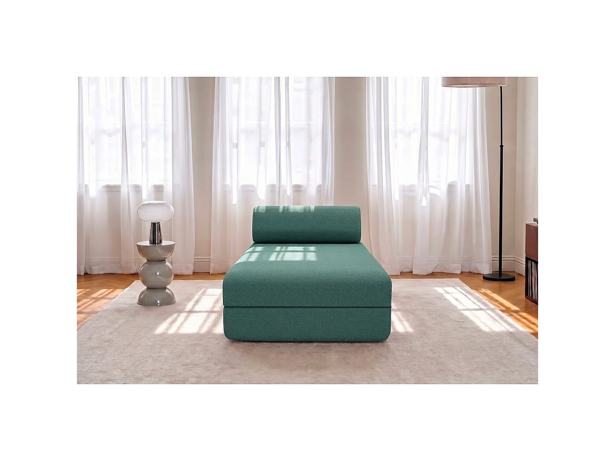 Chaise longue convertible en tejido liso verde.