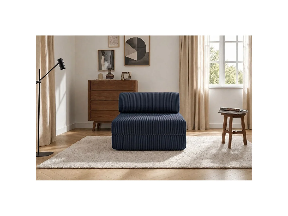 Blauwe corduroy fauteuil, geschikt om mee te ontspannen