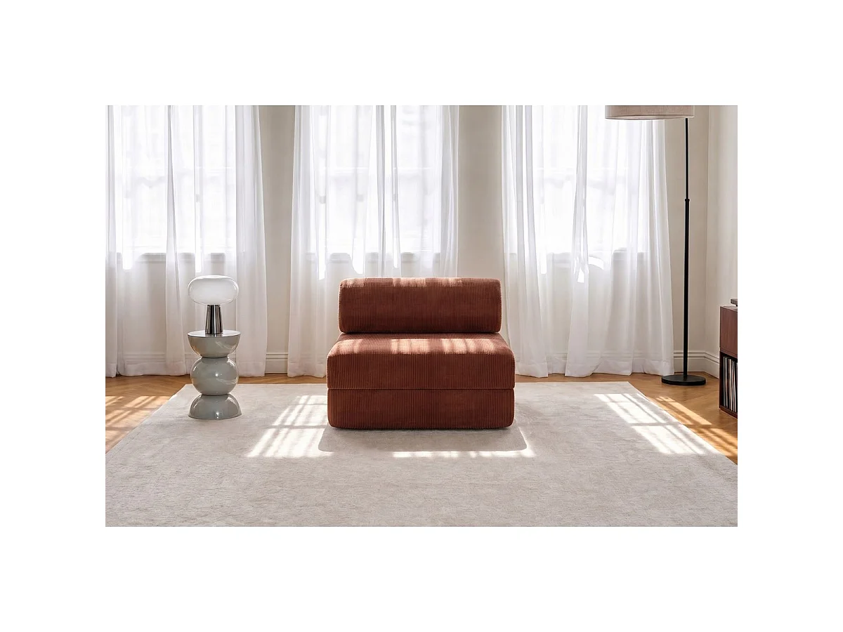 Omvormbare fauteuil van terracotta corduroy