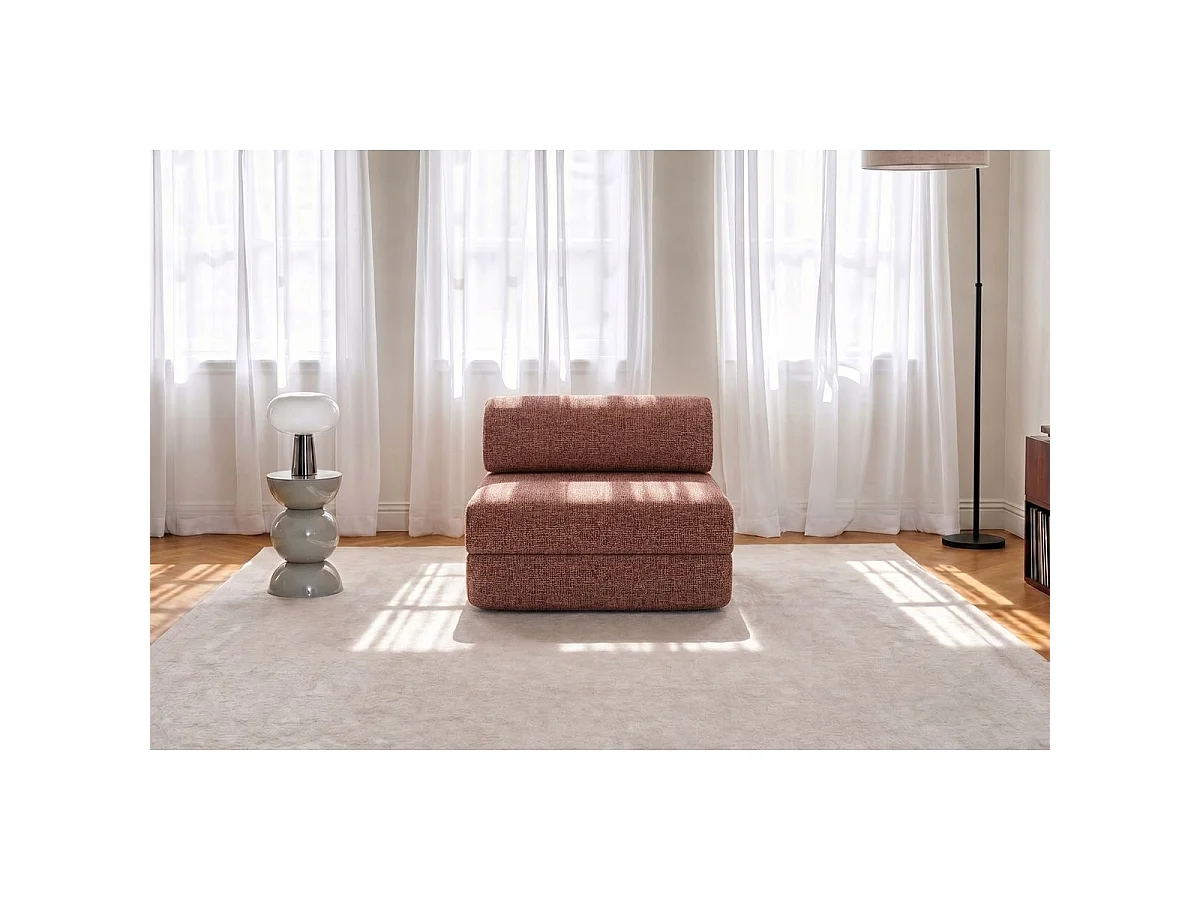 Rode tweed fauteuil die omgebouwd kan worden tot fauteuil