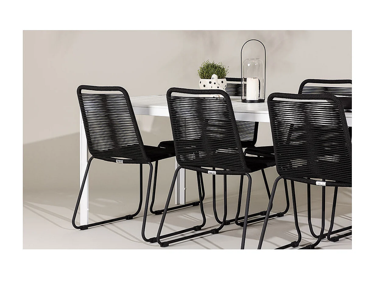 Break set de jardin table 90x205cm blanc, 6 chaises noires.