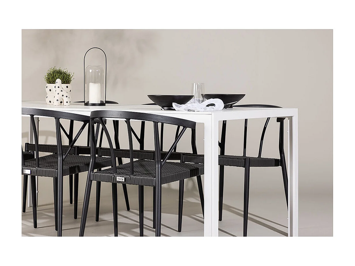 Break set de jardin table 90x205cm blanc, 6 chaises noires.