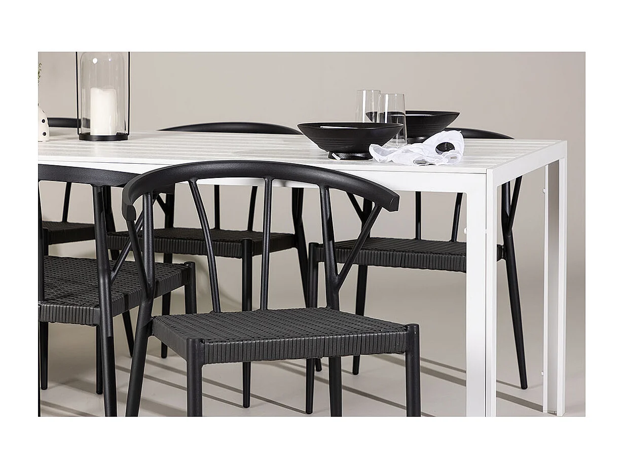 Break set de jardin table 90x205cm blanc, 6 chaises noires.