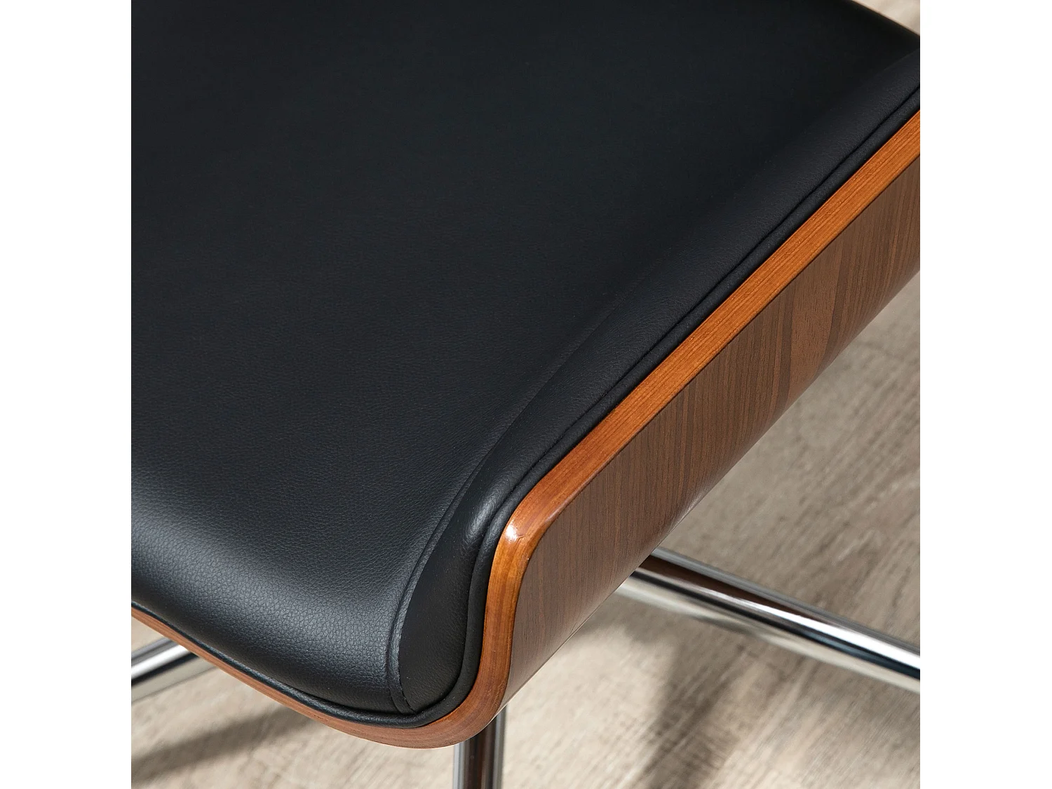 Chaise de bureau à roulettes pivotante en similicuir noir, réglable en hauteur, cadre en métal argenté