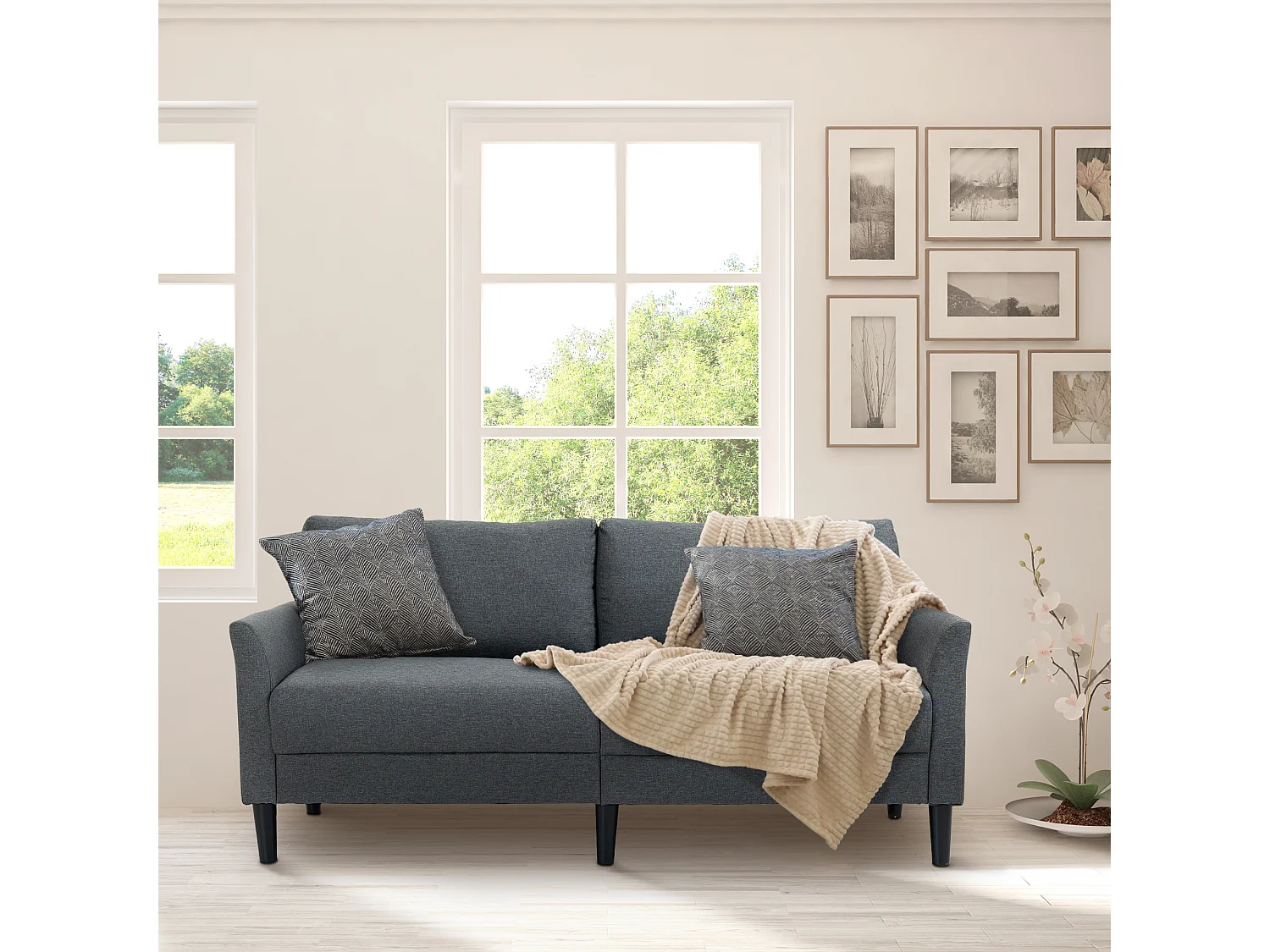 Canapé 2 places style contemporain assises larges profondes accoudoirs courbés piètement effilé bois hévéa noir polyester gris foncé