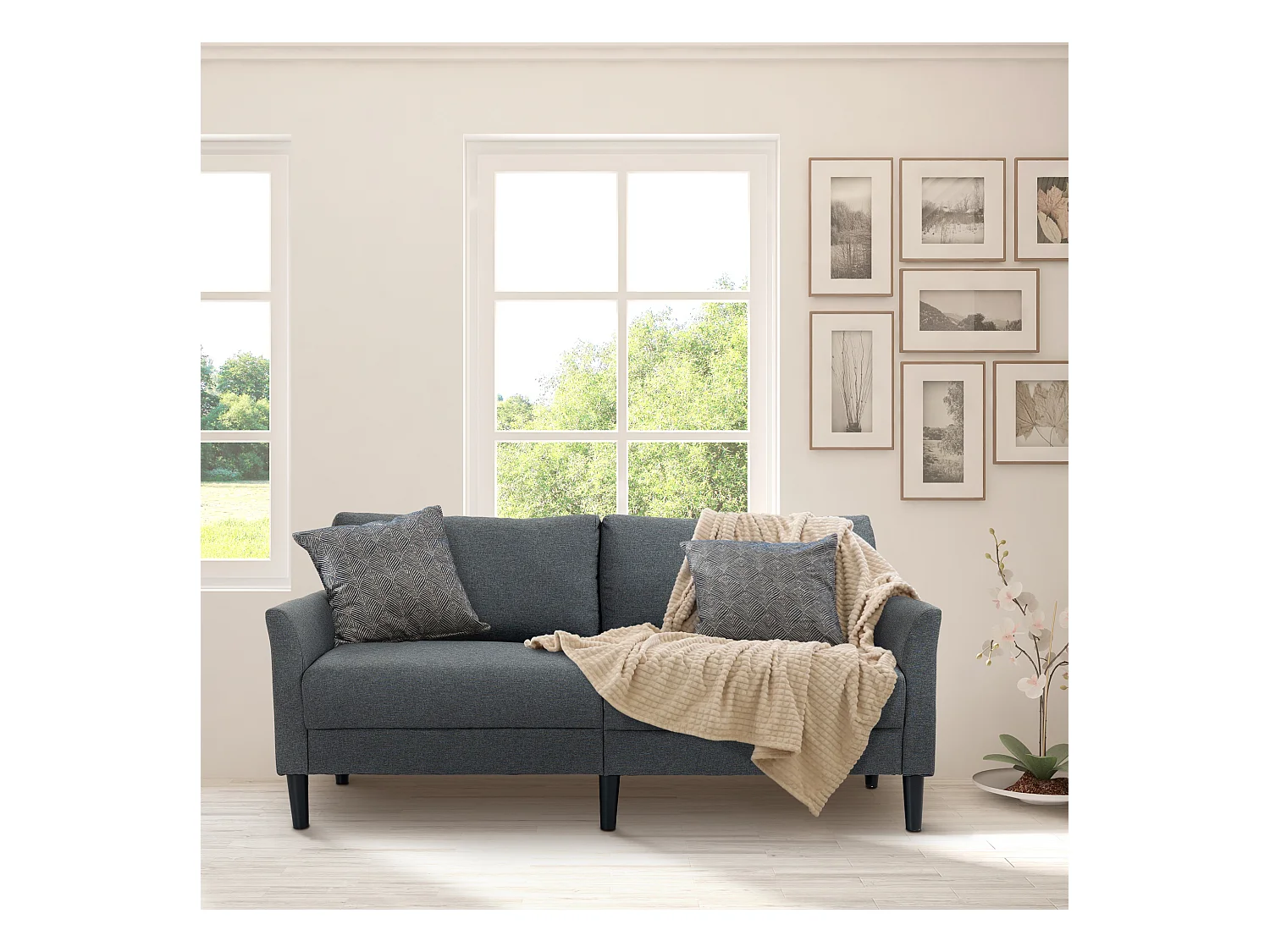 Canapé 2 places style contemporain assises larges profondes accoudoirs courbés piètement effilé bois hévéa noir polyester gris foncé