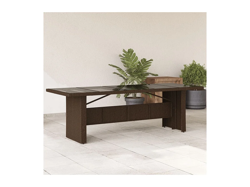 Table de jardin avec dessus en verre marron résine tressée