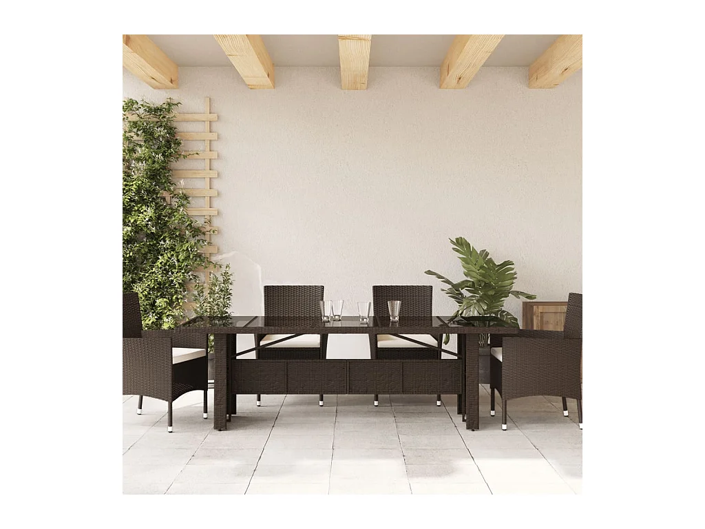 Table de jardin avec dessus en verre marron résine tressée
