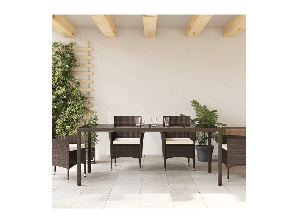 Table de jardin avec dessus en verre marron résine tressée