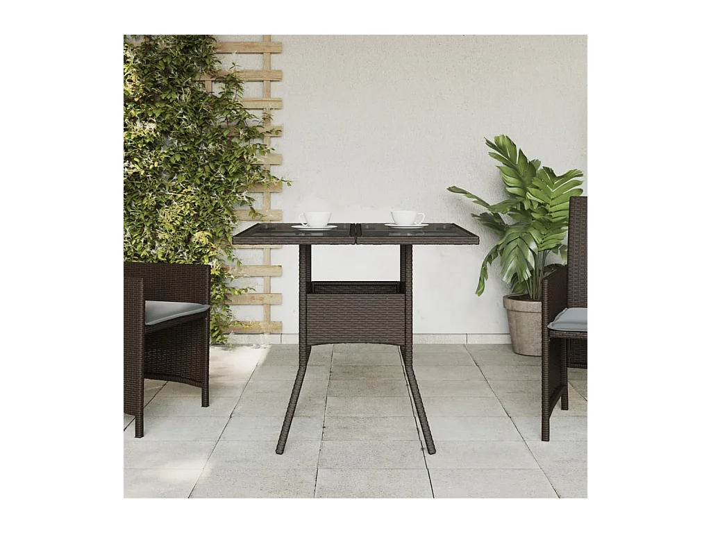 Table de jardin avec dessus en verre marron résine tressée