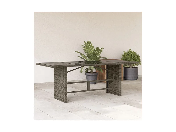 Table de jardin avec dessus en verre gris résine tressée