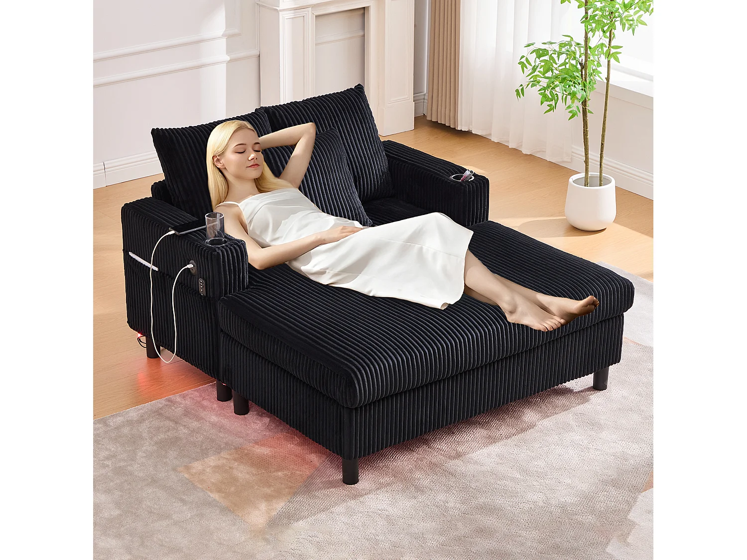 Canapé relax XXL en velours avec ports USB, éclairage LED et accoudoirs intégrés, noir (126x56x26.5cm)