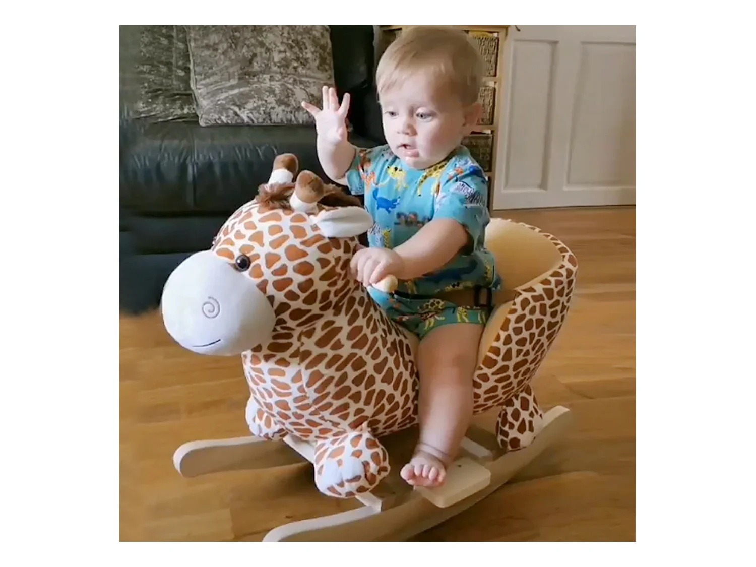 Jouet à bascule modèle girafon ceinture de sécurité fonction musicale 32 pistes marron beige