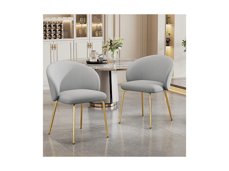 Juego de 2 sillas de comedor tapizadas en terciopelo gris con reposabrazos y patas de metal dorado