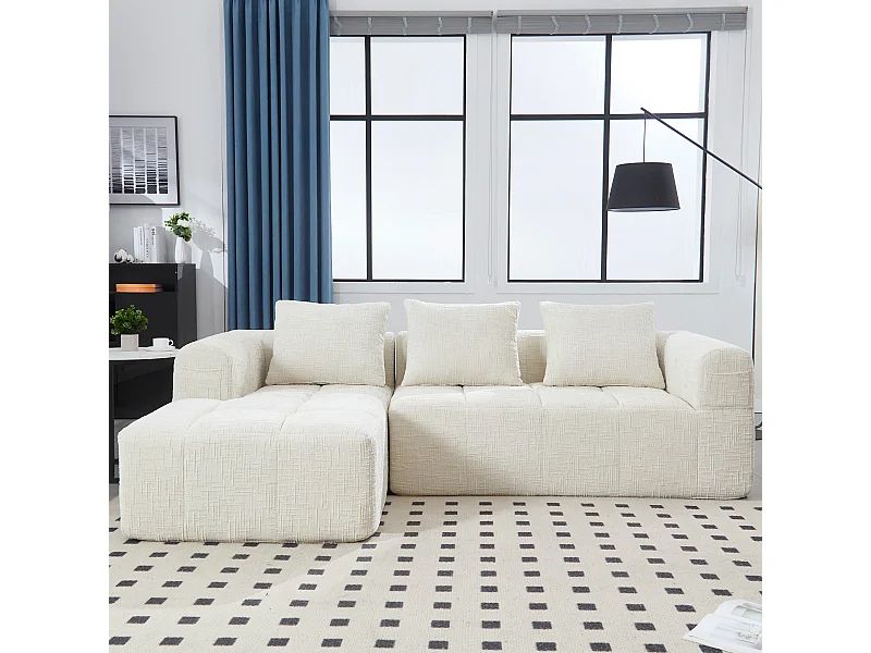 Sofá en forma de L, de chenilla beige, de tres plazas con reposabrazos y cojines, ideal para salón y oficina