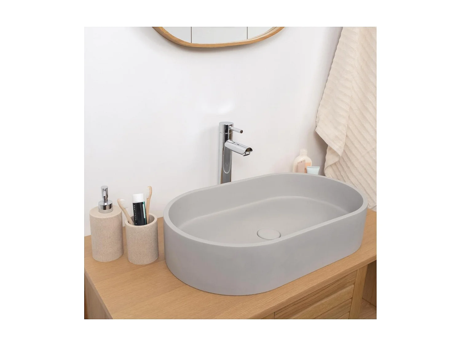 Lavabo sobre encimera ovalado ALAN de 60x35 cm en hormigón gris