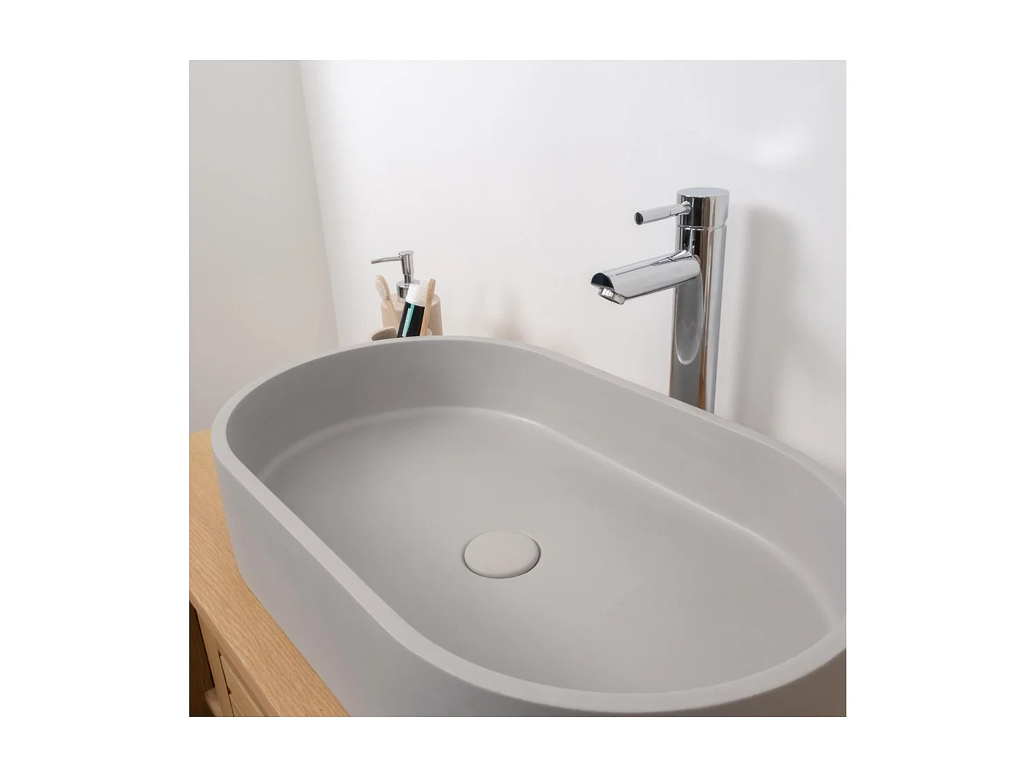 Lavabo sobre encimera ovalado ALAN de 60x35 cm en hormigón gris