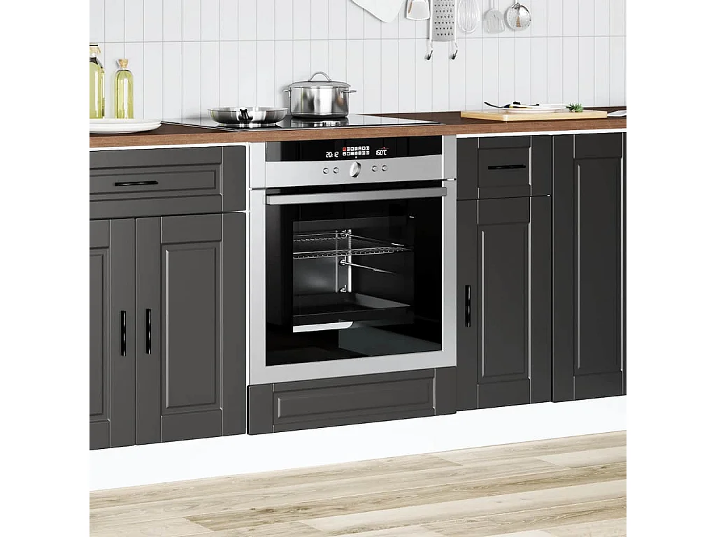 zwarte bewerkte houten ovenkast