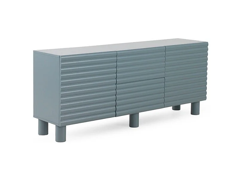 Buffet bleu avec relief ondulé sur les portes et les tiroirs