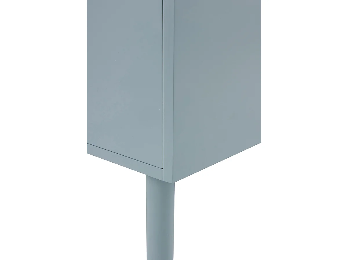 Aparador azul con cantos redondos en las esquinas de puertas