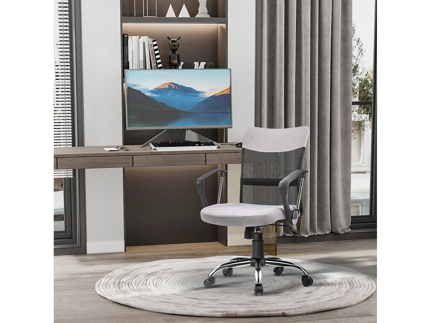 Poltrona da ufficio in tessuto grigio girevole ed ergonomica