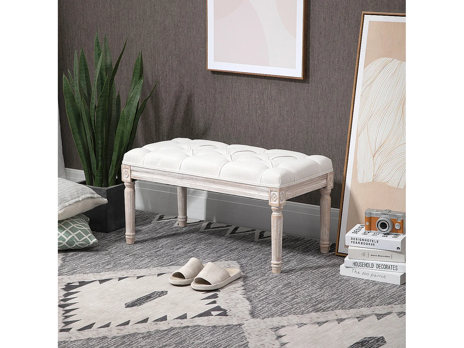 Panca imbottita con rivestimento in tessuto e gambe in legno