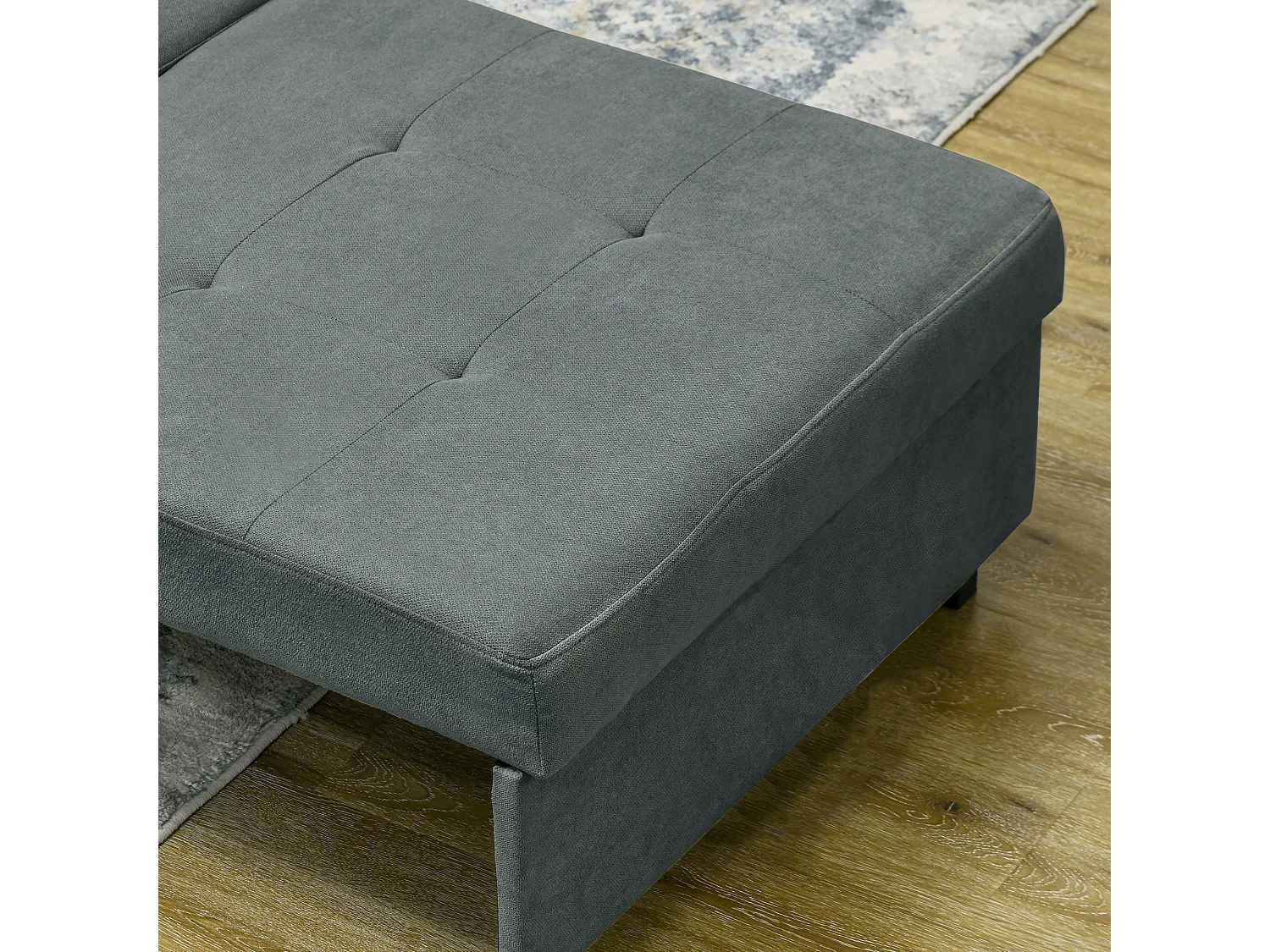 Poltrona letto con 2 cuscini e spazio portaoggetti grigio