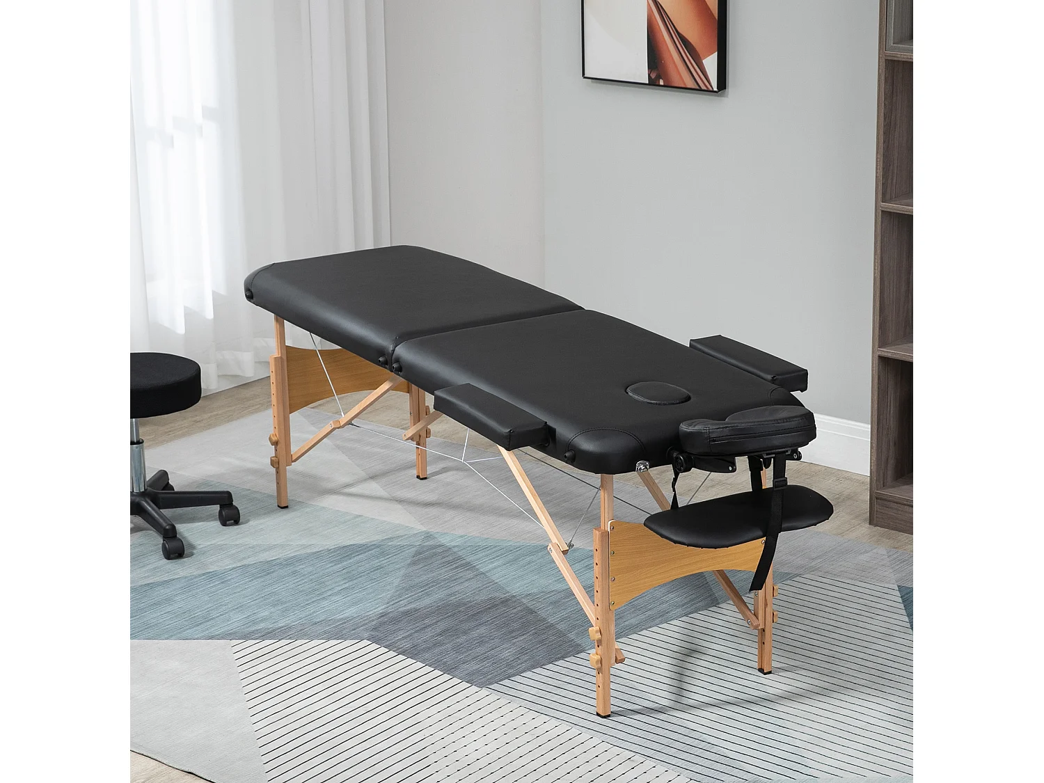 Lettino per massaggio pieghevole con altezza regolabile nero