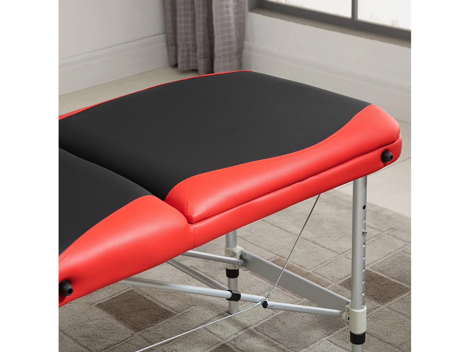 Lettino da massaggio pieghevole ad altezza regolabile, nero e rosso