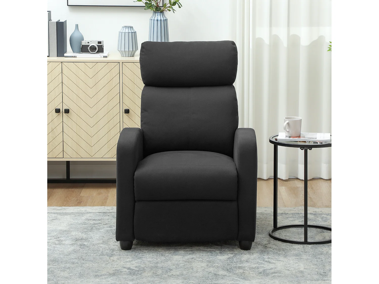 Poltrona relax reclinabile manualmente con poggiapiedi in tessuto nero